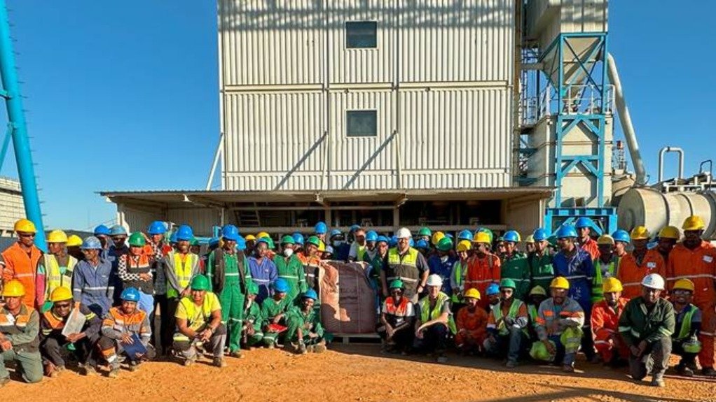 Molo mine employees with the first tonne of SuperFlake concentrate produced at the mine